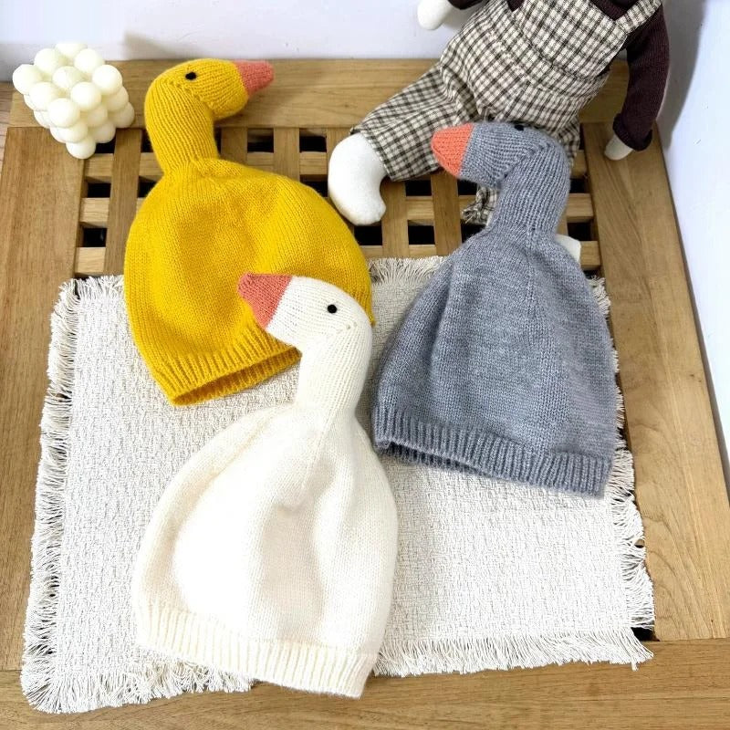 Duck beanies in yellow, grey and white