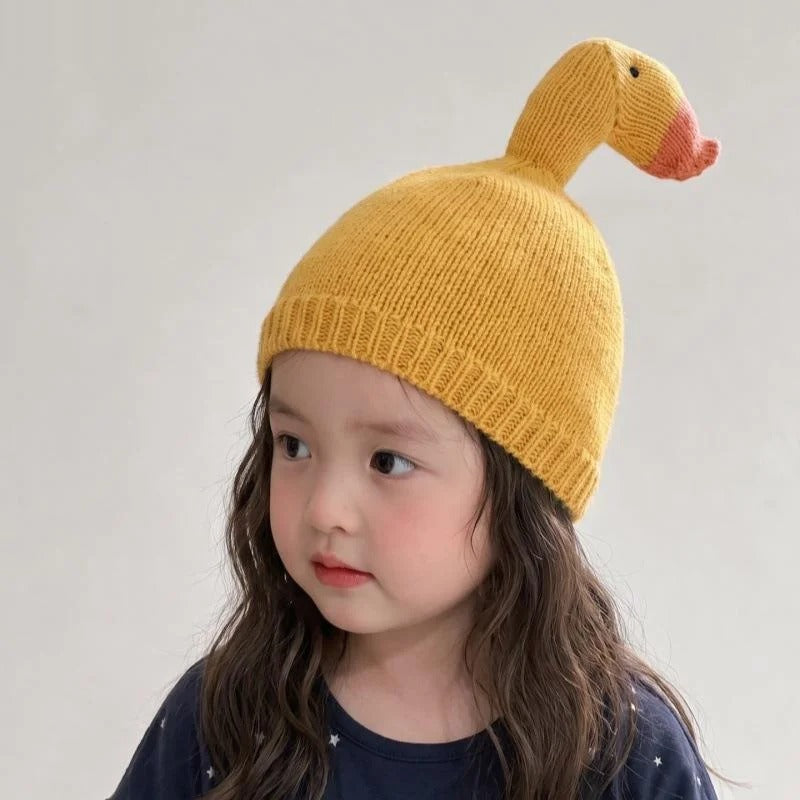 Yellow duck knit beanie, worn