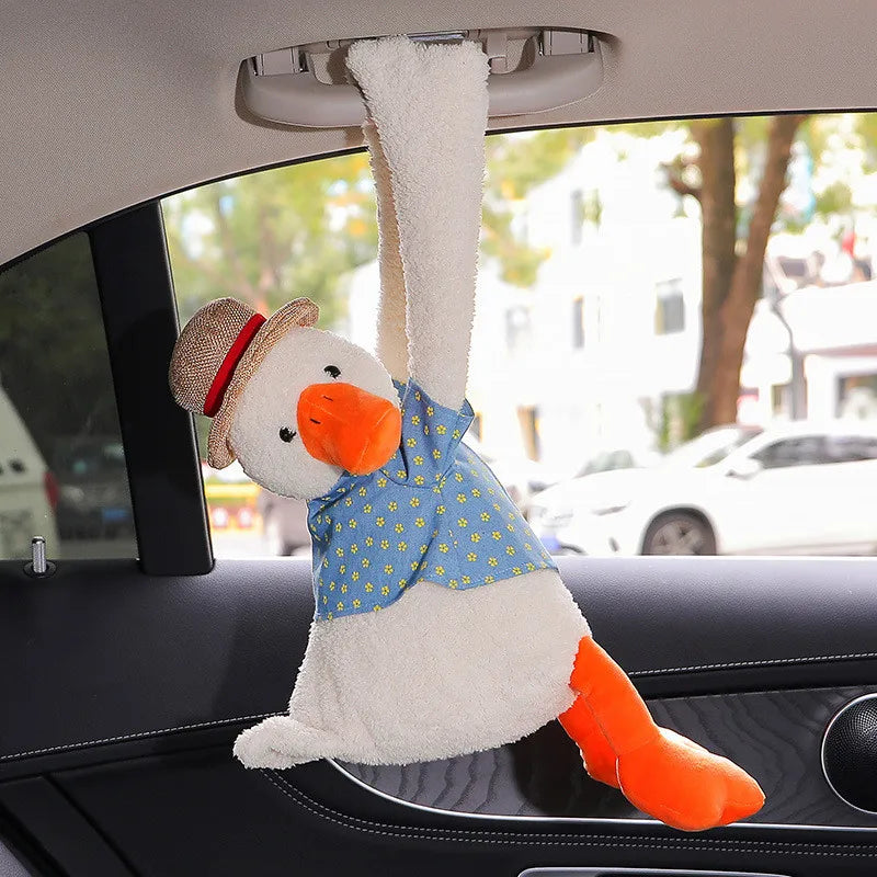 Duck hanging from a car grab handle