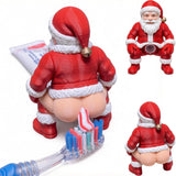 Cheeky Santa toothpaste squeezer on a tube with toothbrush